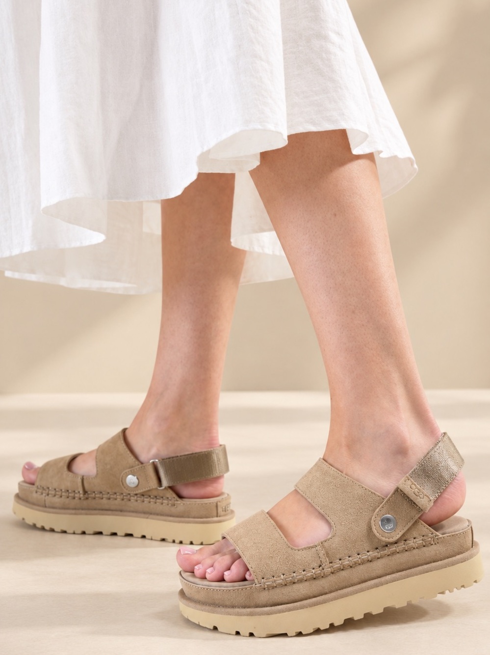 UGG Goldenstar Glide Sandals in Sand